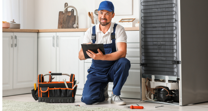 Expert repair of smart refrigerator control panel and electrical system in Dubai showing circuit board diagnostics